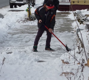 Brennan Shoveling Snow
